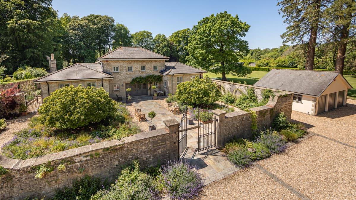 Timsbury former coach house for sale includes its own tennis court and "impressive" redwoods